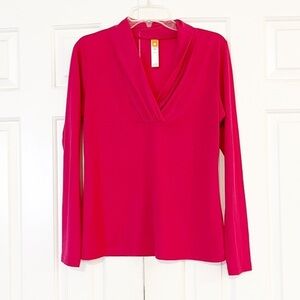 Lucy long sleeve raspberry pink v-neck top w/ floral detail. Size Medium